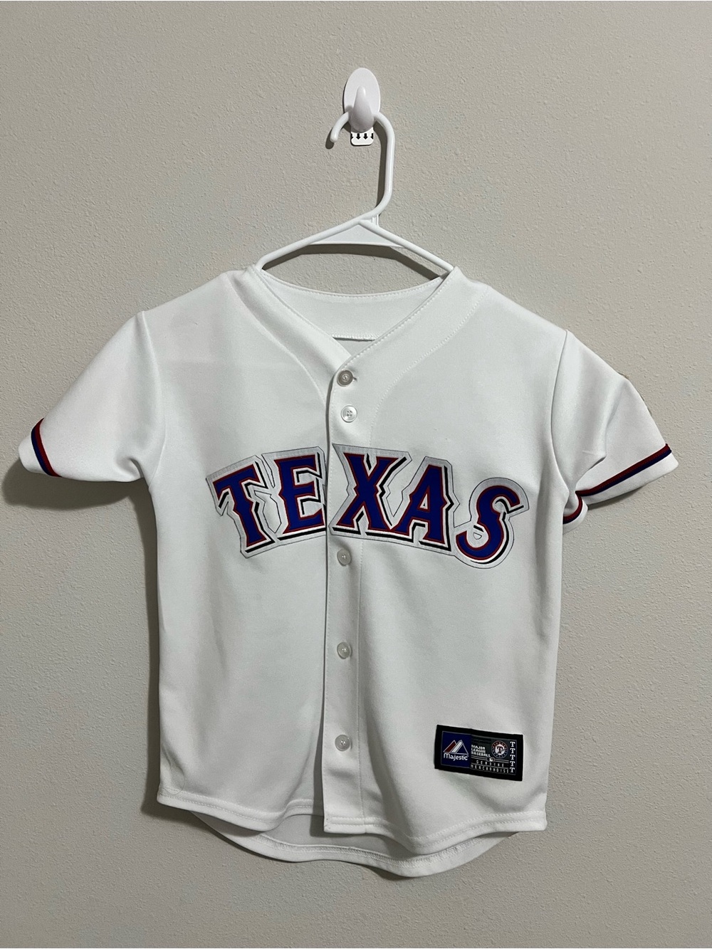 Majestic White Texas Kids Baseball Jersey with Blue and Red Trim